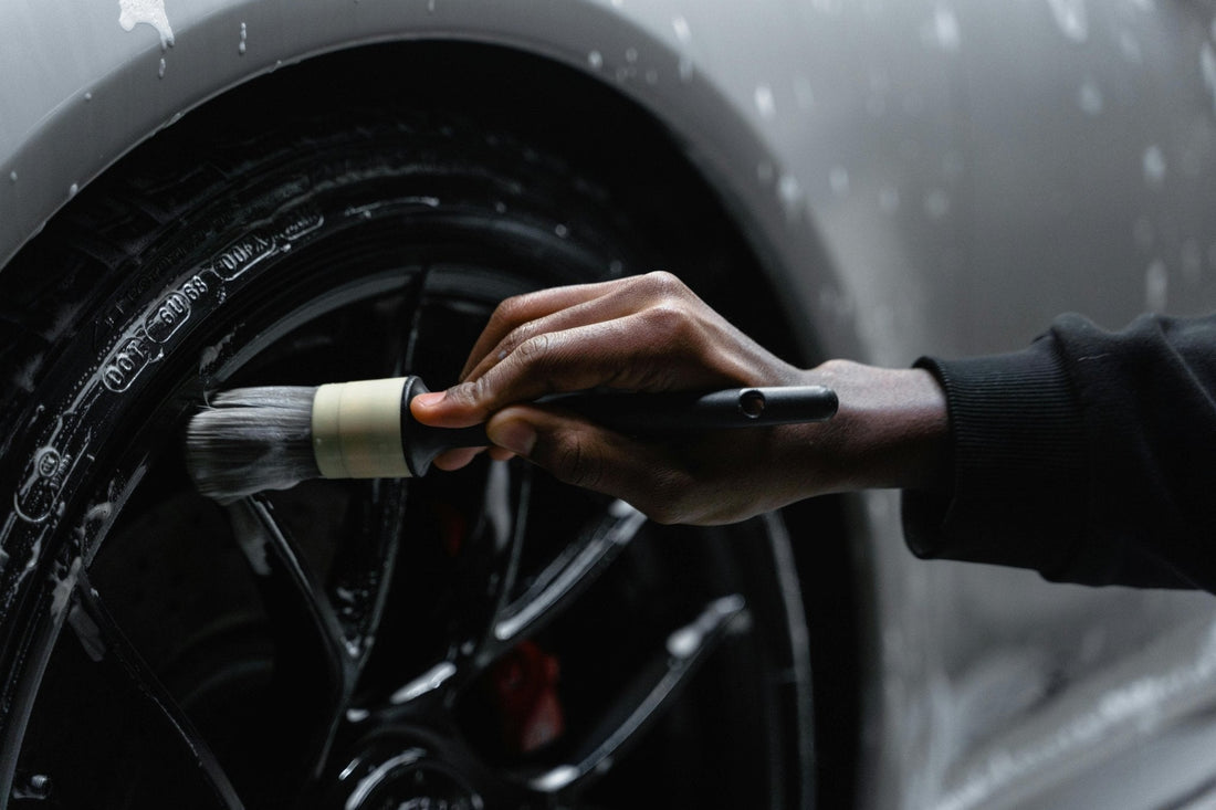Wheel cleaning using a brush
